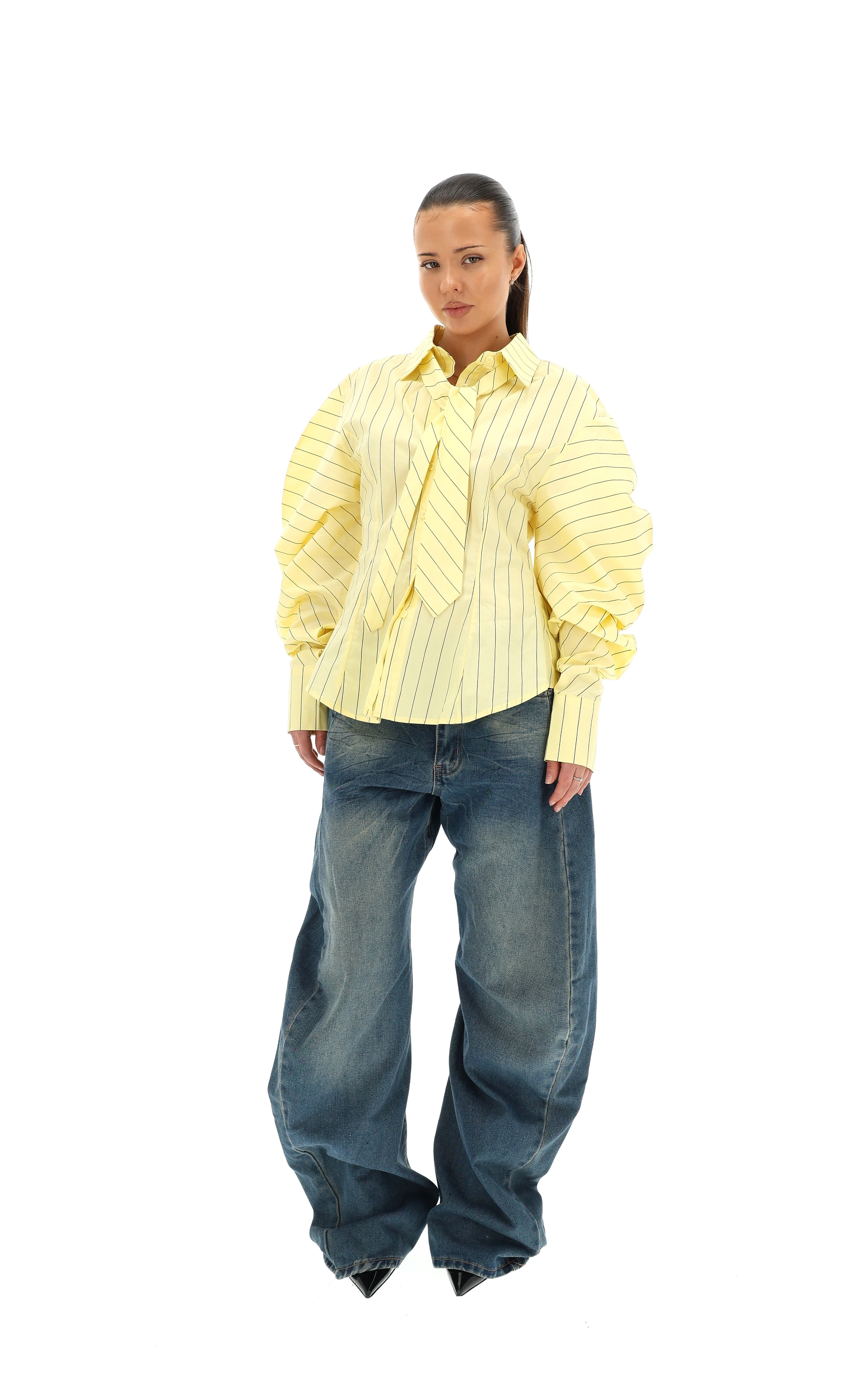PLAČIŲ KLEŠNIŲ BAGGY JEANS
