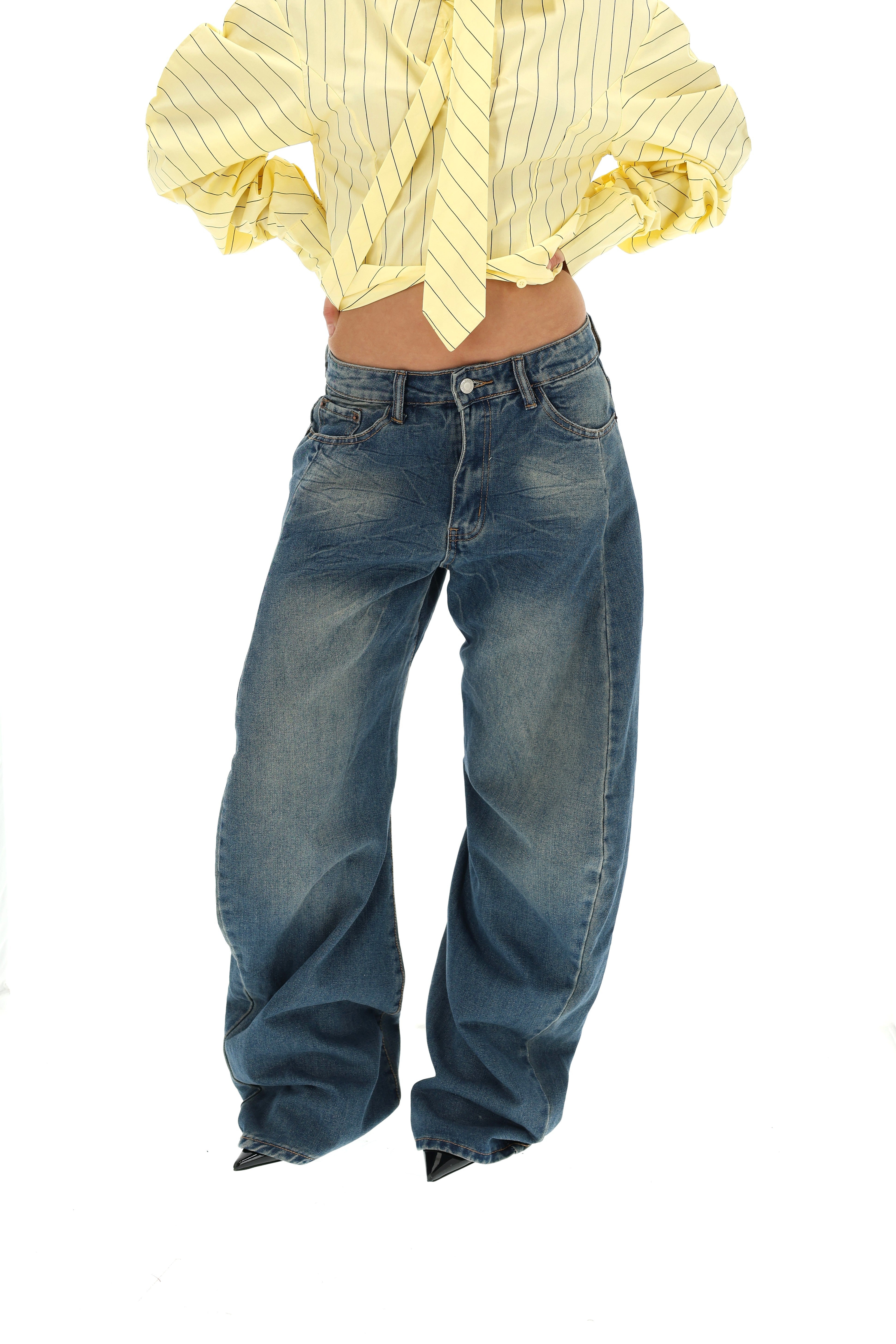 PLAČIŲ KLEŠNIŲ BAGGY JEANS